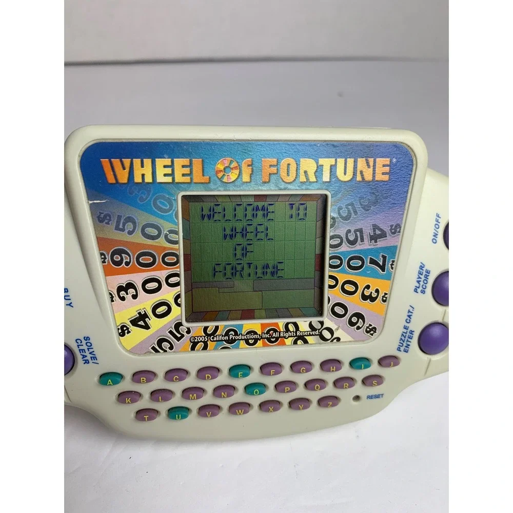 Y2K Wheel of Fortune Handheld Electronic Game 2005 ‎ Retro Puzzle Works